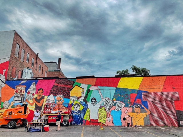 Beyond Walls and RAW artists worked together to create portions of this mural on Boys and Girls Club of Lynn building